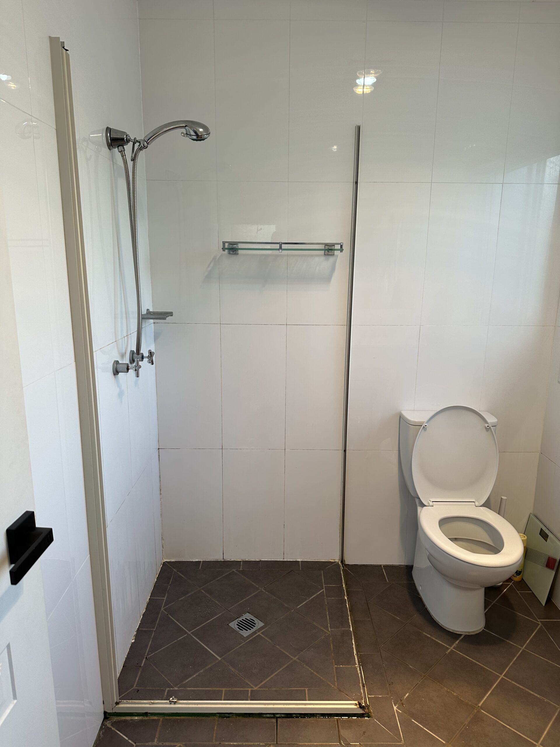 Old run-down shower in need of repair