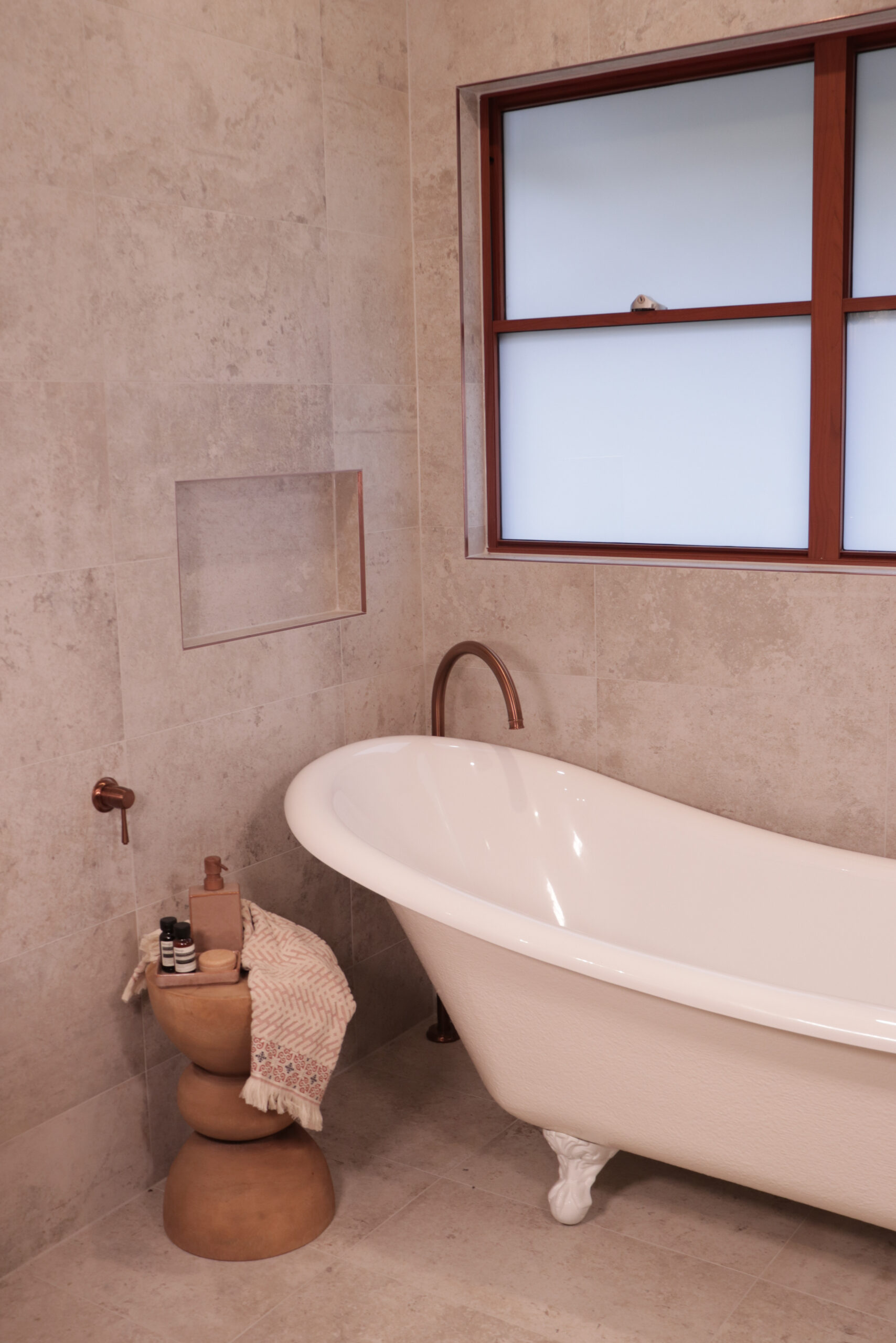 Final finished shower repair with brand new checked tiled floor and glass surround.